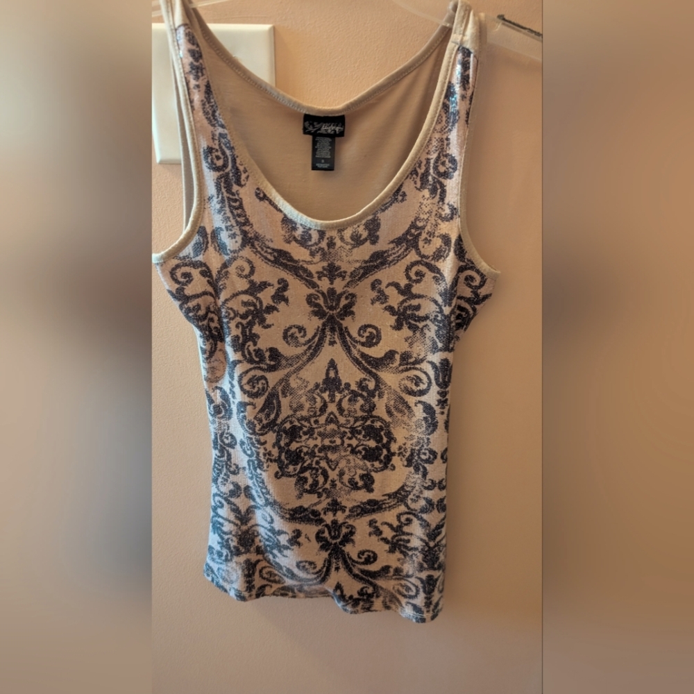 Never worn Shimmery Beige tank With Black Design